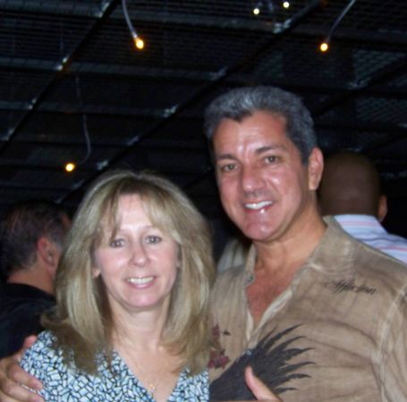 Bruce Buffer posing for a photo shoot with his wife, Annie. 