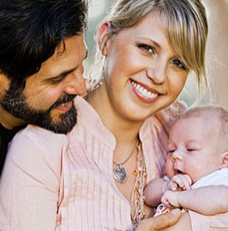 Zoie Laurel May Herpin's mother Jodie Sweetin's first marriage was with Shaun Holguin, a Los Angeles police officer, in 2002.