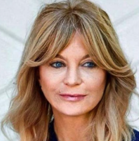 Goldie Hawn, an American actress, gained prominence through her appearances on the NBC sketch comedy show "Rowan & Martin's Laugh-In."